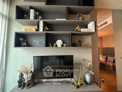 Stylish living room with modern decor and wall-mounted TV