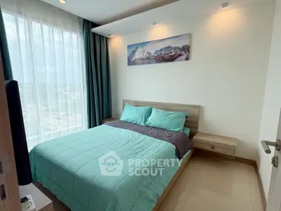 Modern bedroom with large window and scenic artwork, featuring a cozy bed and stylish decor.