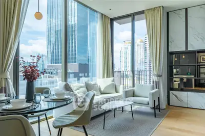 Luxurious modern living room with stunning city view and elegant decor