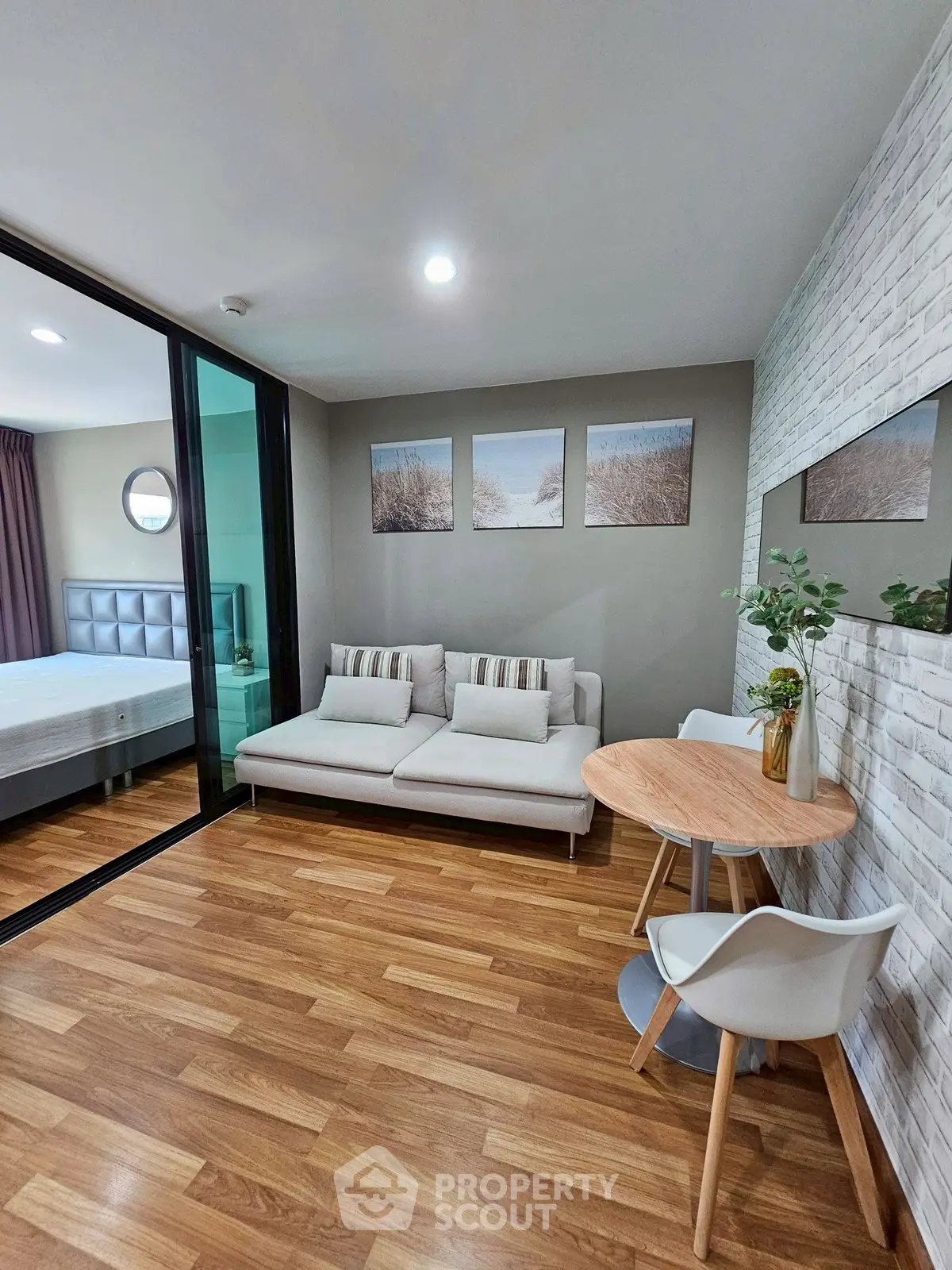 Modern living room with wooden flooring and stylish decor