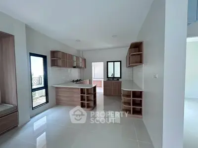 Modern kitchen with sleek cabinetry and open layout in a contemporary home.