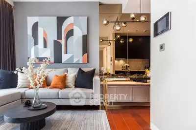 Modern living room with stylish decor and open layout, featuring a cozy sofa and elegant lighting.
