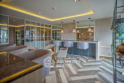 Modern living room with stylish decor and elegant lighting
