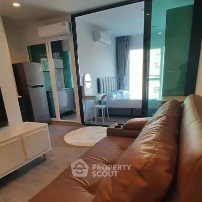 Modern studio apartment with open layout and stylish furnishings