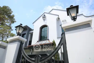 Elegant modern house exterior with stylish architecture and lush greenery