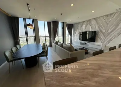 Luxurious living room with stunning city view and modern decor