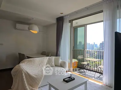 Modern living room with balcony view in a high-rise apartment