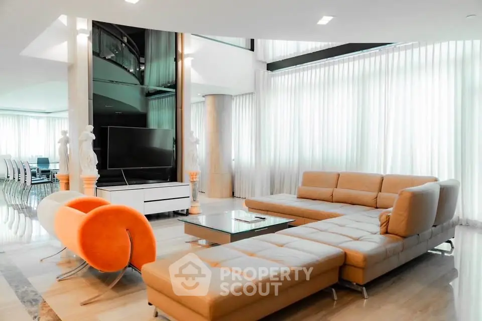 Luxurious modern living room with elegant furniture and natural light