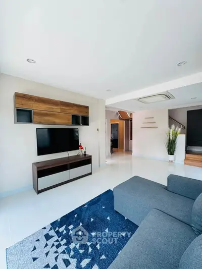 Modern living room with sleek furniture and stylish decor