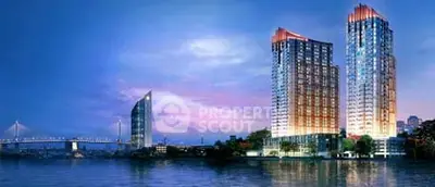 Stunning waterfront high-rise buildings with city skyline and bridge view at dusk.