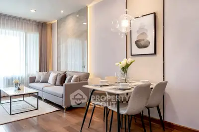 Elegant living room with modern dining area and stylish decor