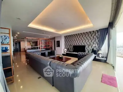 Luxurious living room with modern decor and spacious seating area