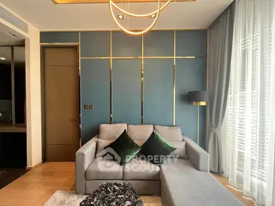 Stylish modern living room with elegant lighting and plush sofa in a luxurious apartment.