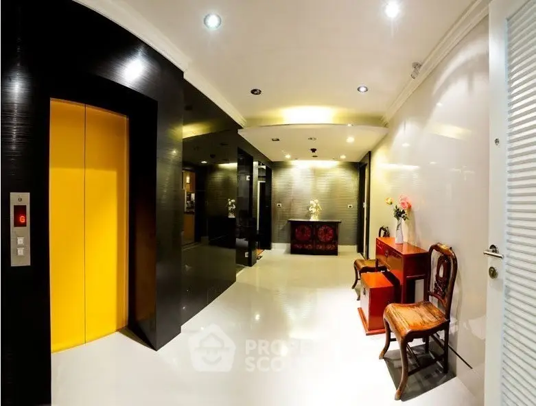 Luxurious modern elevator lobby with elegant decor and seating area