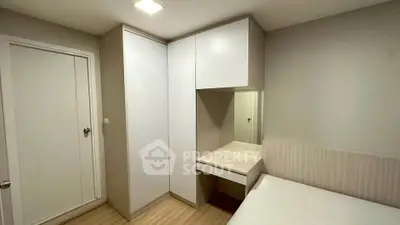 Modern bedroom with built-in wardrobe and minimalist design