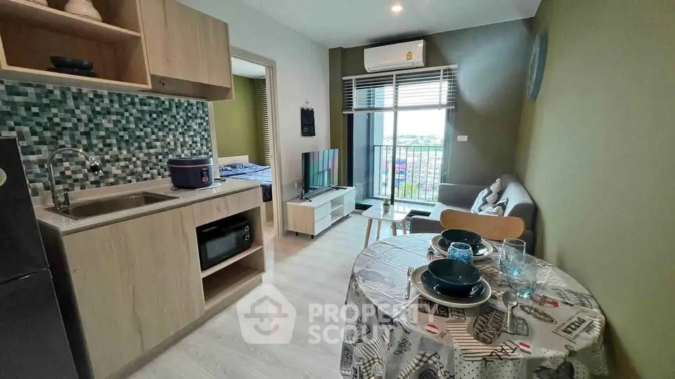 Modern compact apartment with open kitchen and cozy living area