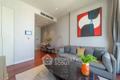 Modern living room with stylish decor and elegant dining area