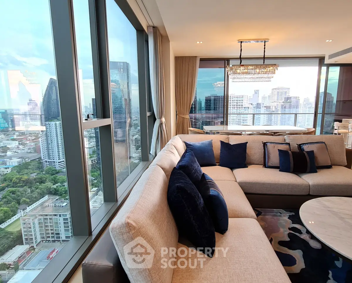 Luxurious corner unit living room with panoramic city view and elegant decor
