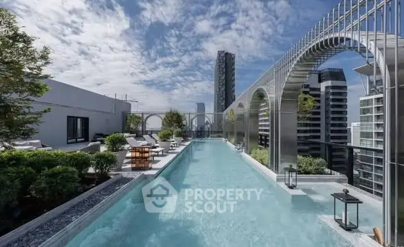 Luxurious rooftop pool with stunning city views and modern architecture.