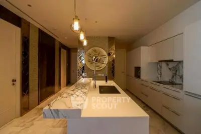 Luxurious modern kitchen with marble countertops and elegant lighting