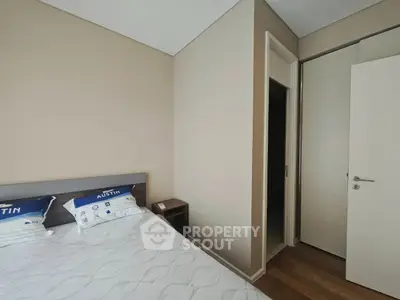 Cozy bedroom with modern design and ample closet space
