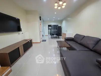 Spacious modern living room with sleek furniture and open layout