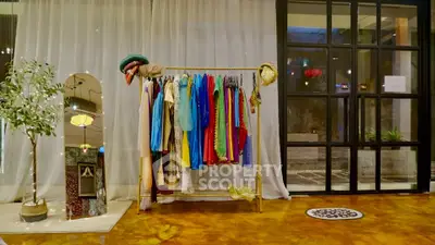 Chic interior space with vibrant clothing rack and modern decor