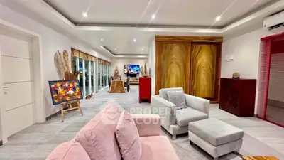 Spacious modern living room with stylish decor and ample natural light