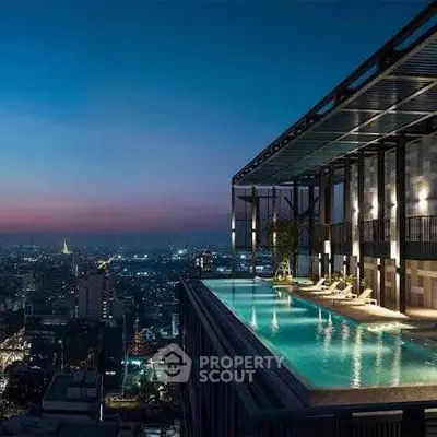 Luxurious rooftop pool with stunning city skyline view at dusk