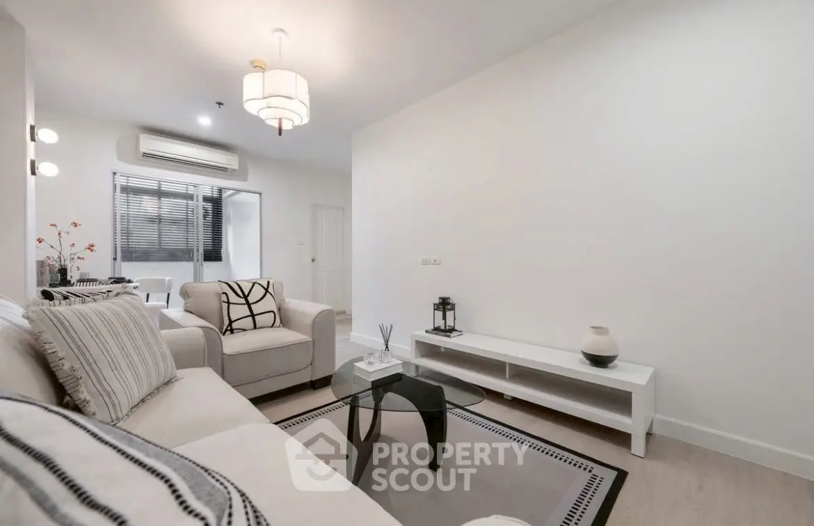 Modern living room with stylish decor and cozy seating area