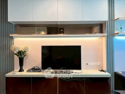 Modern living room with sleek TV setup and elegant decor