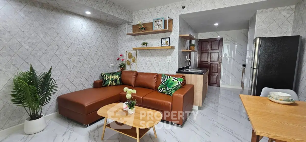 Modern living room with stylish decor and open kitchen layout