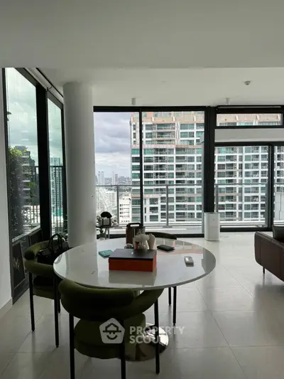 Modern high-rise apartment with stunning city view and stylish interior design.