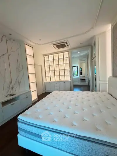 Luxurious bedroom with elegant design and built-in storage solutions