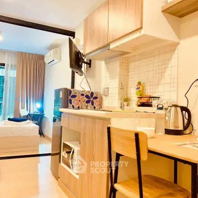 Modern studio apartment with open kitchen and cozy living area