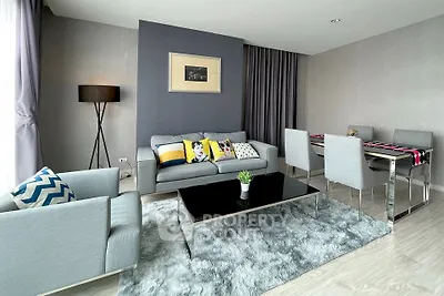 Modern living room with stylish decor and cozy seating area