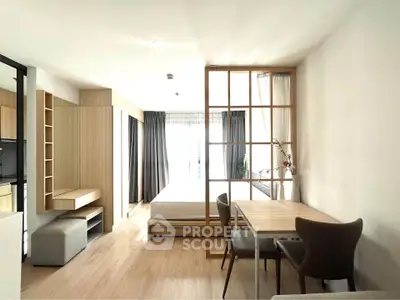 Modern studio apartment with open layout and stylish furnishings