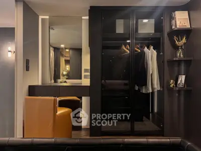 Luxurious modern bedroom with sleek wardrobe and elegant decor