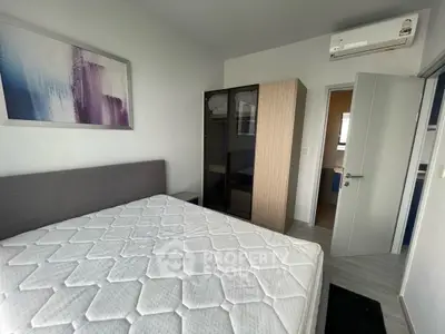 Modern bedroom with air conditioning and stylish decor