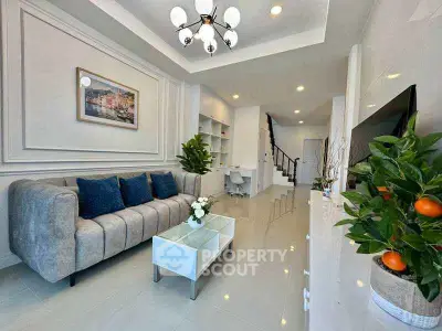 Spacious modern living room with elegant decor and natural light
