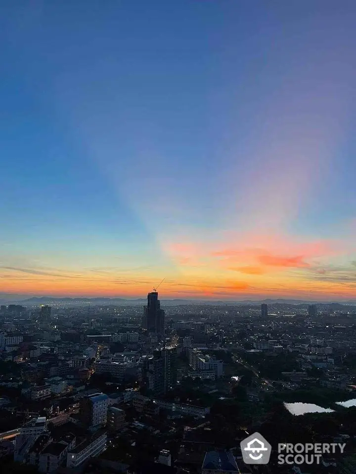 Stunning cityscape view at sunset with vibrant sky colors