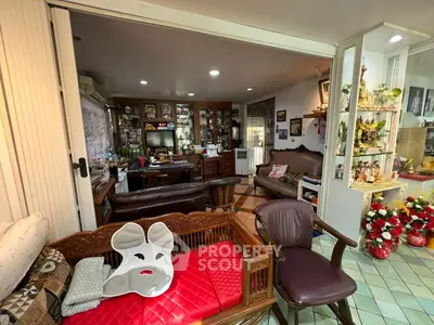 Charming living room with eclectic decor and cozy seating area