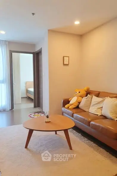 Cozy living room with modern decor and plush sofa in a stylish apartment