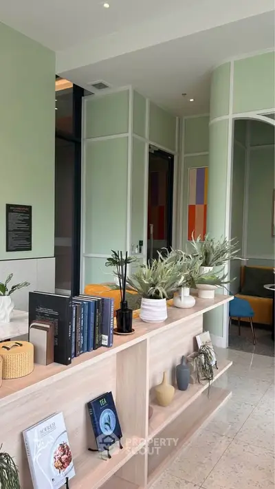 Modern interior with stylish decor and open shelving in a cozy living space.