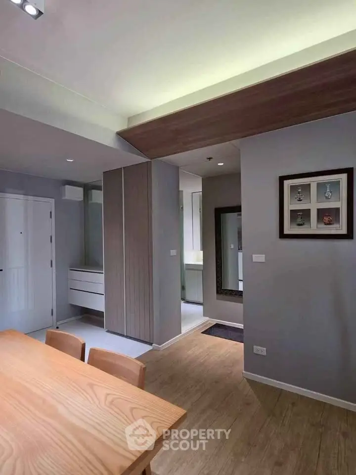 Modern interior with wooden dining table and stylish decor