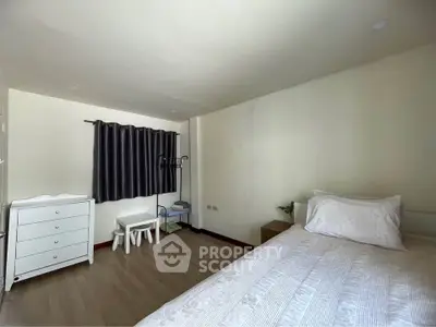 Cozy bedroom with minimalist decor and natural light