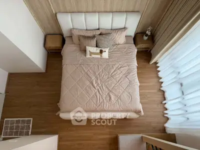 Elegant bedroom with cozy bed and stylish decor in modern apartment