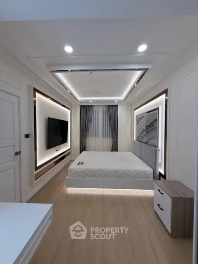 Luxurious modern bedroom with sleek design and ambient lighting