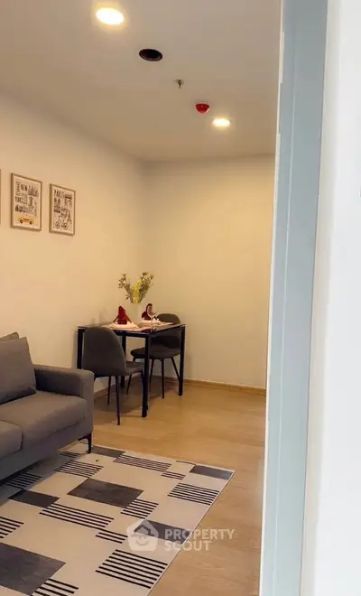 Cozy modern living room with stylish decor and dining area