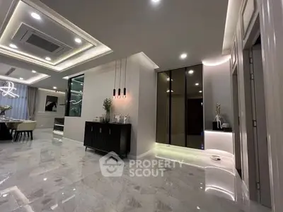 Luxurious modern living room with elegant lighting and marble flooring